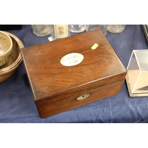 130 - Rosewood and mother-of-pearl hinge top box, 25cm.