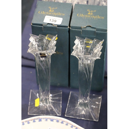 139 - Pair of Gleneagles Crystal candlesticks, 19cm, each boxed.