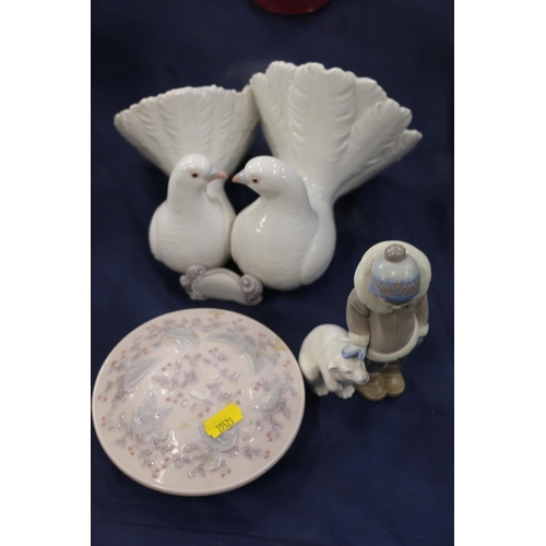 155 - Lladro to include a model of doves, a boy with bear and a trinket box.  (3)