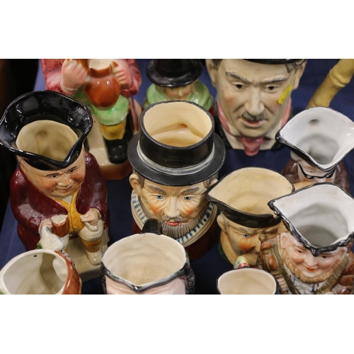 156 - Character jugs to include Charlie Chaplin, Royal Doulton, etc.  (15)