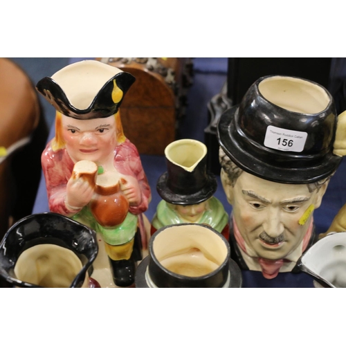 156 - Character jugs to include Charlie Chaplin, Royal Doulton, etc.  (15)