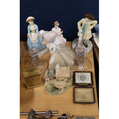 172 - Royal Worcester and Nao figurines, a pair of candlesticks, a small carriage clock, etc.