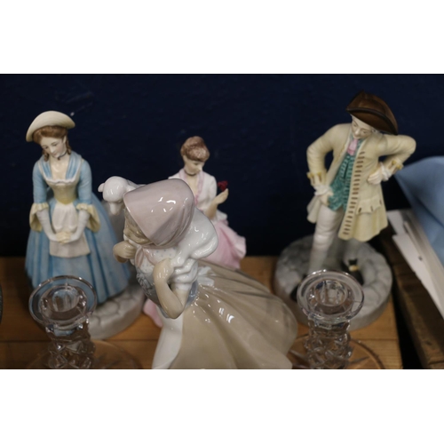 172 - Royal Worcester and Nao figurines, a pair of candlesticks, a small carriage clock, etc.