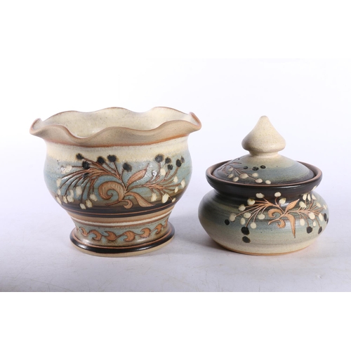 26 - Studio Pottery in muted colours with incised decoration to include a bowl with fluted rim, and three... 