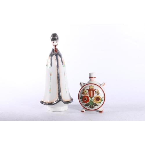 34 - Zsolnay Pecs of Hungary floral decorated two-handled moon flask vase, 11cm, and a Hungarian figure, ... 