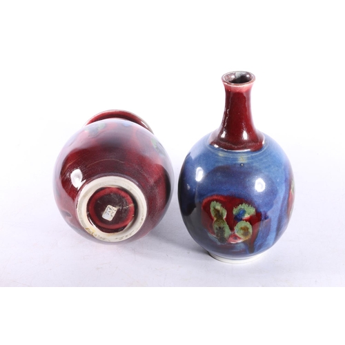 35 - Two flambe style vases signed 'VR' to base.  (2)