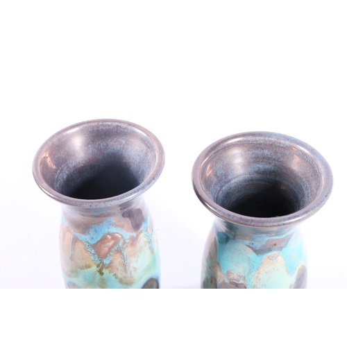 39 - Two similar Studio Pottery lustre vases with blue drip glaze decoration, marked 'FID 06' to base, 17... 