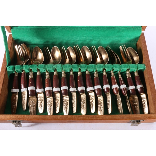 44 - Samran of Thailand treen handled flatware, cased.