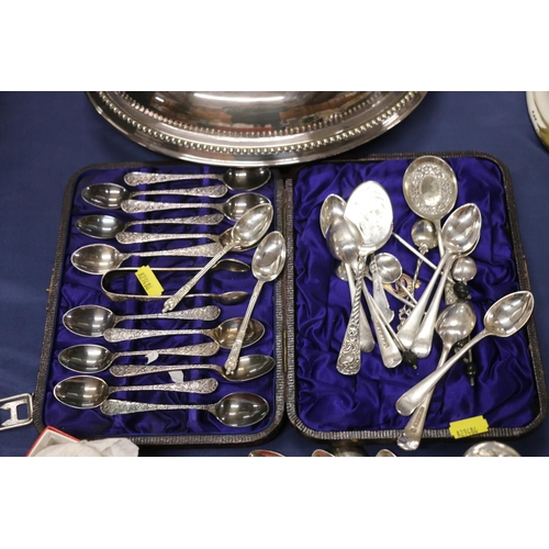 74 - Silver-plated ware to include an entrée dish, flatware, etc., and a silver topped toilet jar decorat... 