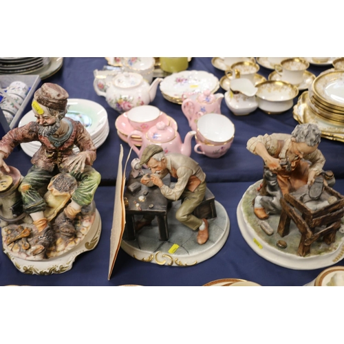 76 - Three Capodimonte porcelain figure groups, two signed Magni.  (3)