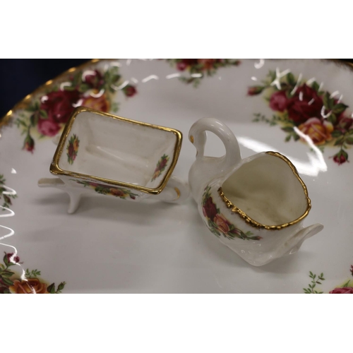 81 - Royal Albert Old Country Roses to include a sandwich plate, side plates, a cheese knife, a miniature... 