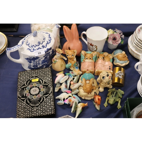 89 - Pendelfin figures, a Masons blue and white teapot, a bead work purse, and other decorative items.