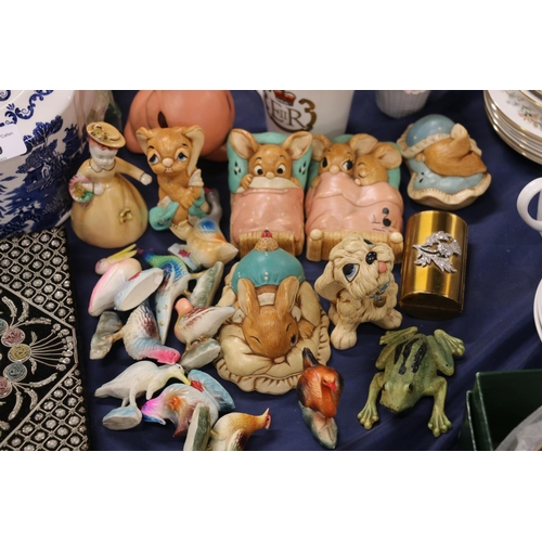 89 - Pendelfin figures, a Masons blue and white teapot, a bead work purse, and other decorative items.