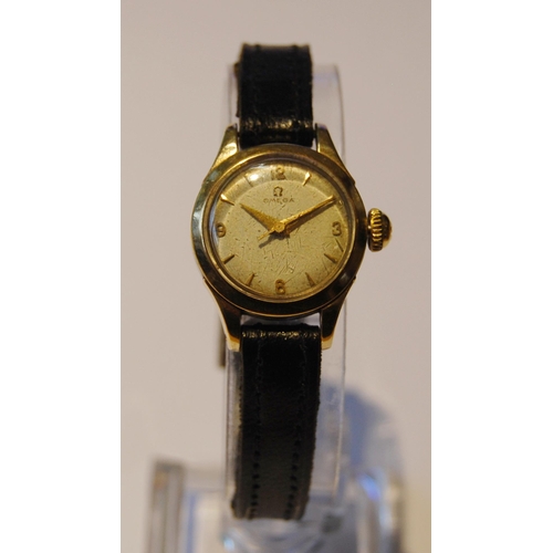 108 - Omega lady's wristwatch in stainless steel case with gold plated bezel, silvered dial, gold-coloured... 