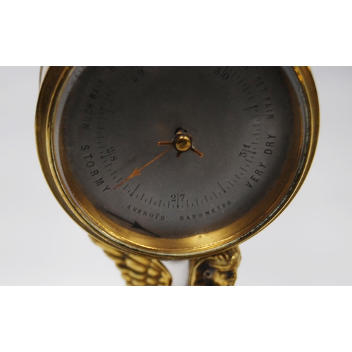 169 - Egyptian Revival brass drumhead desk clock with silvered dial on winged Sphinx support and walnut in... 