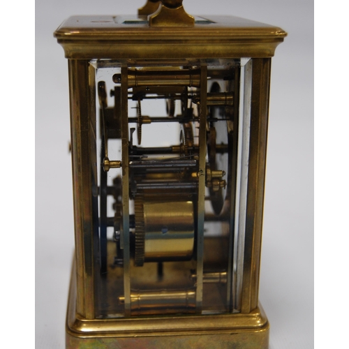 172 - Brass four glass carriage clock with viewing window to the top displaying the movement, the white en... 