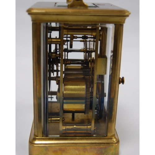 172 - Brass four glass carriage clock with viewing window to the top displaying the movement, the white en... 