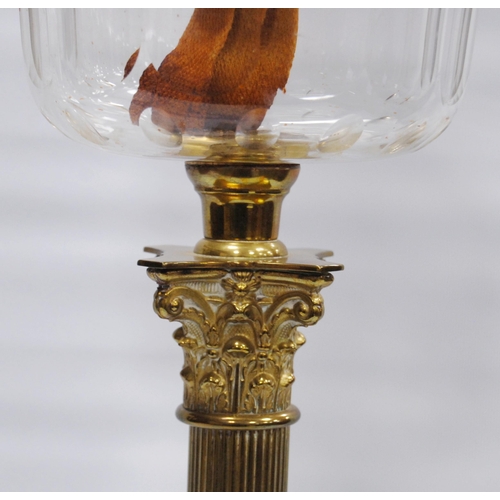 183 - Young's brass oil lamp, c. late 19th/early 20th century, with later glass funnel and shade, original... 