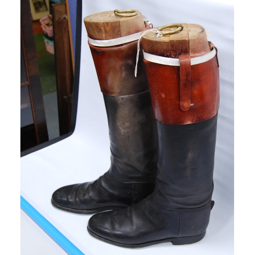 176 - Pair of black leather riding boots with wooden trees, brass ring handles to the trees, sole length a... 