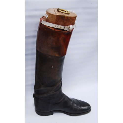 176 - Pair of black leather riding boots with wooden trees, brass ring handles to the trees, sole length a... 