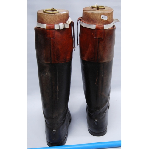 176 - Pair of black leather riding boots with wooden trees, brass ring handles to the trees, sole length a... 