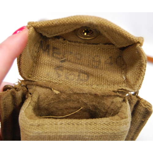 94 - Militaria interest: WWII period liquid pocket field compass contained in a black metal case, with cl... 