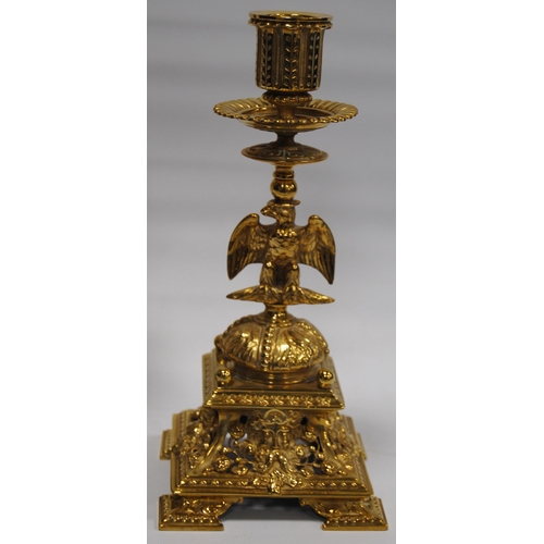 184 - Pair of Neo-Classical influence brass candlesticks, each with a shaped sconce above an eagle knopped... 