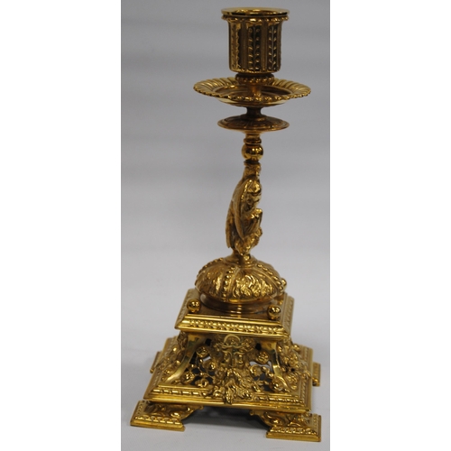 184 - Pair of Neo-Classical influence brass candlesticks, each with a shaped sconce above an eagle knopped... 