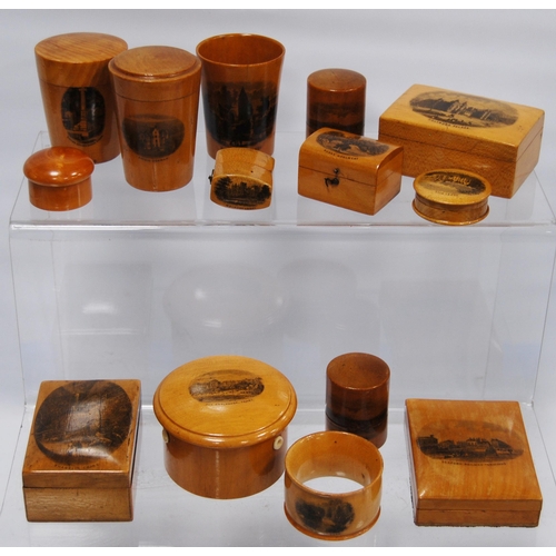 316 - Group of Mauchline ware to include a string box, glass holders, pill box, ring box, cylindrical boxe... 