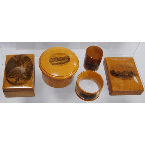 316 - Group of Mauchline ware to include a string box, glass holders, pill box, ring box, cylindrical boxe... 