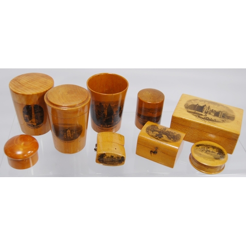 316 - Group of Mauchline ware to include a string box, glass holders, pill box, ring box, cylindrical boxe... 