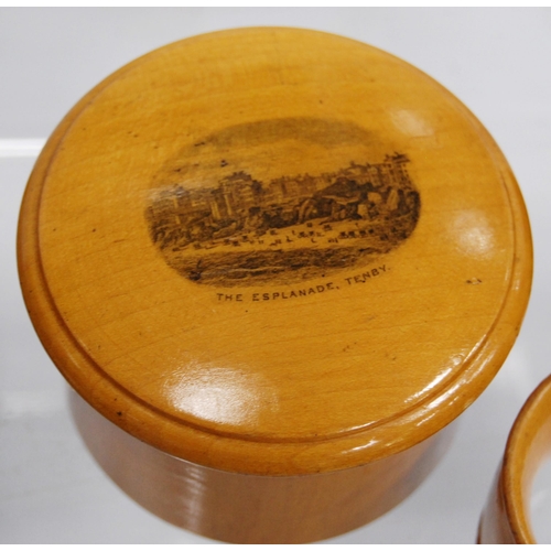 316 - Group of Mauchline ware to include a string box, glass holders, pill box, ring box, cylindrical boxe... 