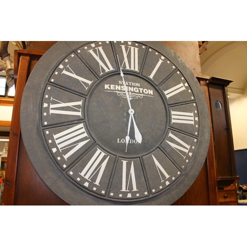 816 - Large circular wall clock 'Station Kensington', 100cm diameter.