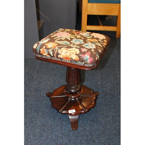 844 - Victorian rosewood revolving stool with needlework tapestry top, 45cm tall. 