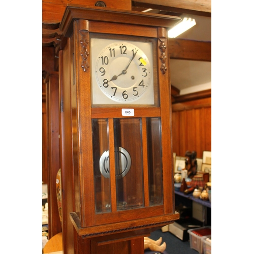 845 - Mahogany cased wall clock. 