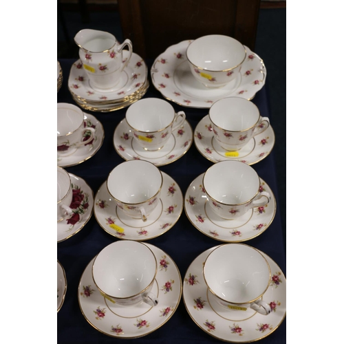 77A - Colclough floral decorated teaset, another part teaset, and a collectors' plate.