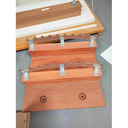 12 - Bookbinding adjustable sewing frame and various rests. 