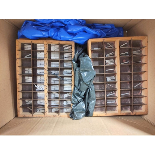 21 - Two boxes containing an assortment of printers type.