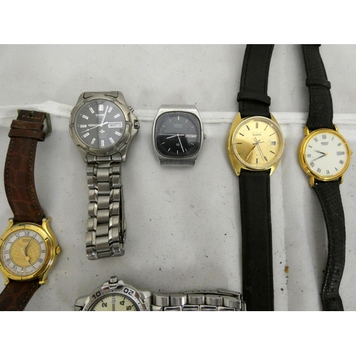 110 - Eight men's Seiko watches mainly quartz.