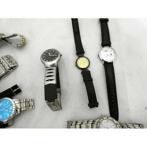 117 - Large bag of men's quartz watches including Toro, Accurist, Rosea, Lorus etc.