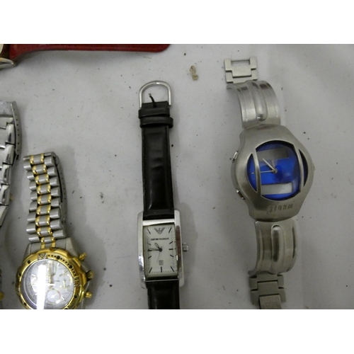 118 - Various men's modern designer watches including Henley, Solo, Armani, Storm, Fossil, Terner.