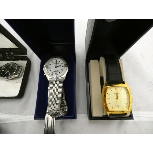 132 - Five boxed men's watches including four Sekonda's and Seiko.