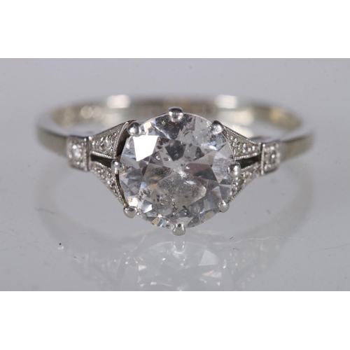 85 - 18ct gold and platinum diamond engagement ring with central 1.5ct diamond and diamond-set shoulders,... 