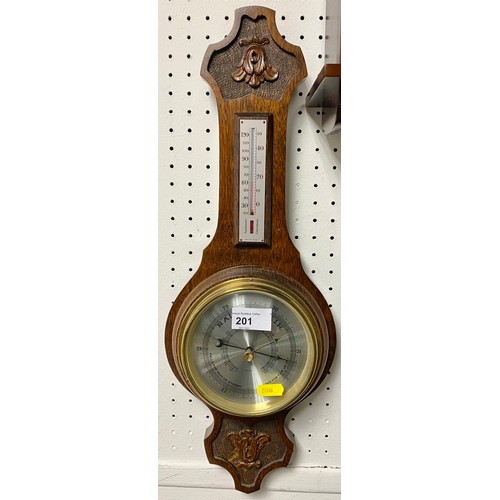 201 - Carved oak aneroid barometer