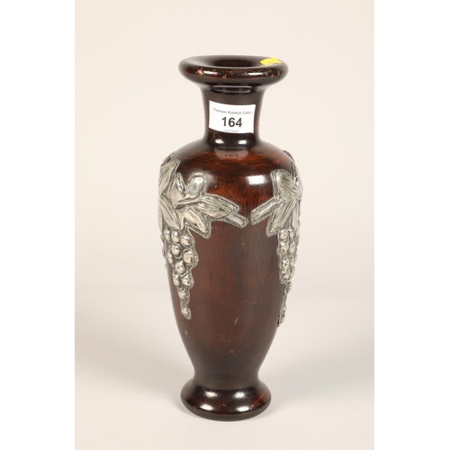 164 - White metal and wood vase with grape design, 28 cm high