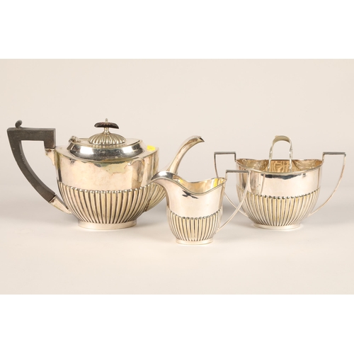 179 - Silver plate three-part tea set with tongs