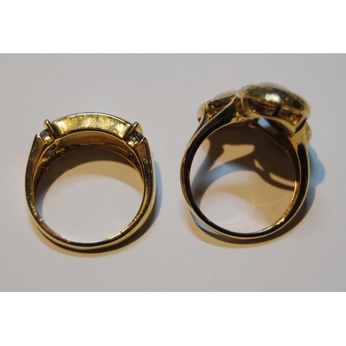 54 - Two 9ct gold rings set with mother of pearl, size N, 11g gross.