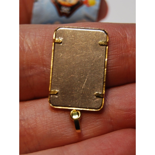 63 - Platinum ingot pendant, 5g, 18ct gold mount, 6g.