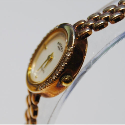 128 - Lady's Rotary 9ct gold bracelet watch with diamond-set bezel, 17.9g gross.