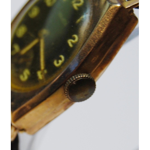 129 - Majex gent's 9ct gold watch of tonneau shape, 1945, on strap.